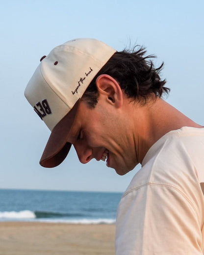 Brown "BEYOND" Hat